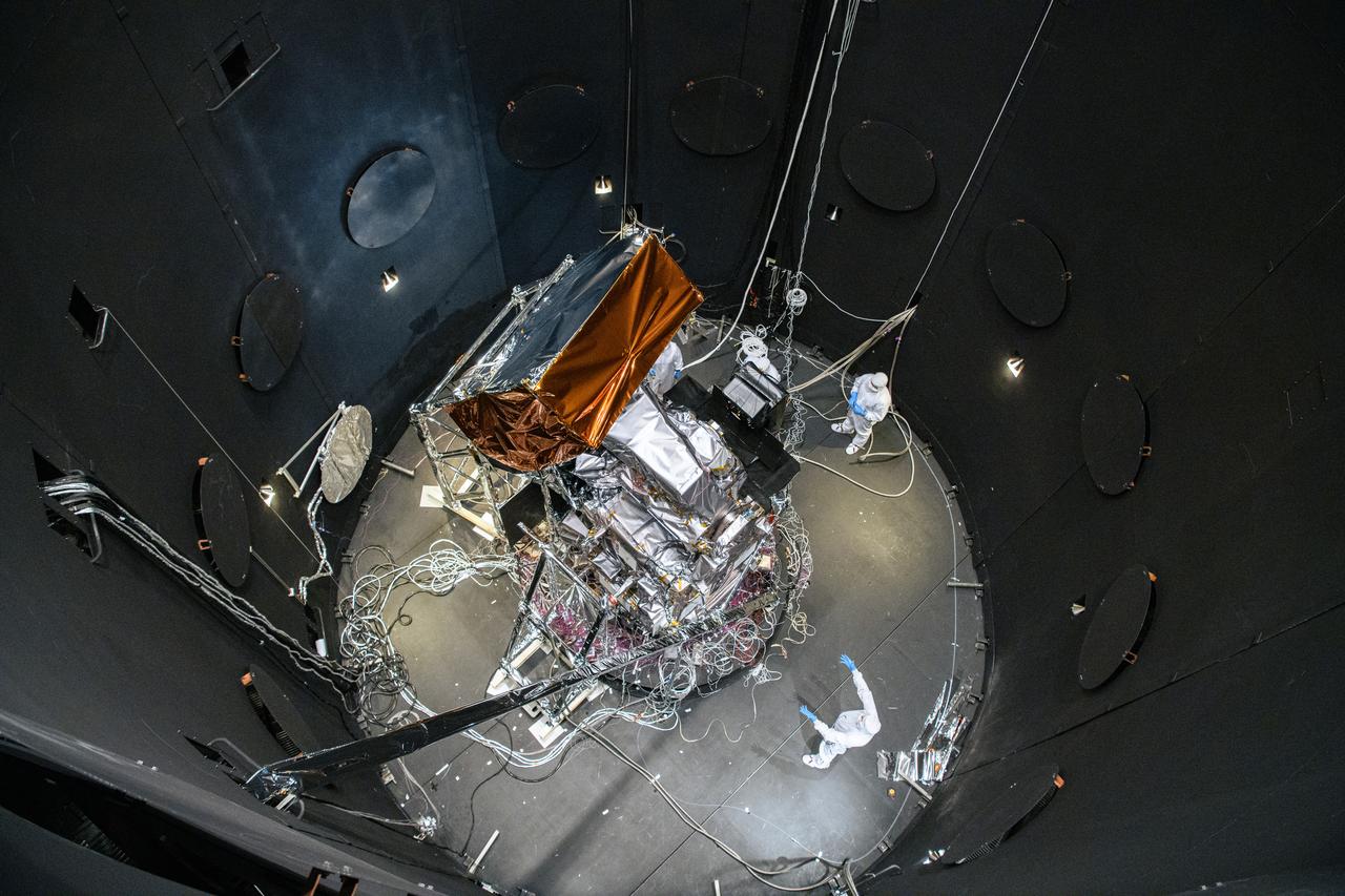 The Plankton, Aerosol, Cloud, ocean Ecosystem (PACE) Observatory inside the Space Environment Simulator (SES) thermal vacuuum chamber before thermal environmental testing at NASA's Goddard Space Flight Center in Greenbelt, Maryland on June 16th, 2023.   PACE's unprecedented spectral coverage will provide the first-ever global measurements designed to identify phytoplankton community composition. The mission will make global ocean color measurements, using the Ocean Color Instrument (OCI), to provide extended data records on ocean ecology and global biogeochemistry along with polarimetry measurements, using the Spectro-polarimeter for Planetary Exploration (SPEXone) and the Hyper Angular Research Polarimeter (HARP2) to provide extended data records on clouds and aerosols. The Earth-observing satellite mission, built at Goddard Space Flight Center in Greenbelt, MD, will continue and advance observations of global ocean color, biogeochemistry, and ecology, as well as the carbon cycle, aerosols and clouds. 