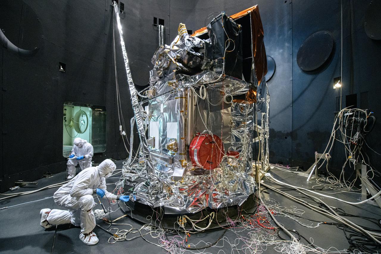 The Plankton, Aerosol, Cloud, ocean Ecosystem (PACE) Observatory inside the Space Environment Simulator (SES) thermal vacuuum chamber before thermal environmental testing at NASA's Goddard Space Flight Center in Greenbelt, Maryland on June 17th, 2023.   PACE's unprecedented spectral coverage will provide the first-ever global measurements designed to identify phytoplankton community composition. The mission will make global ocean color measurements, using the Ocean Color Instrument (OCI), to provide extended data records on ocean ecology and global biogeochemistry along with polarimetry measurements, using the Spectro-polarimeter for Planetary Exploration (SPEXone) and the Hyper Angular Research Polarimeter (HARP2) to provide extended data records on clouds and aerosols. The Earth-observing satellite mission, built at Goddard Space Flight Center in Greenbelt, MD, will continue and advance observations of global ocean color, biogeochemistry, and ecology, as well as the carbon cycle, aerosols and clouds. 