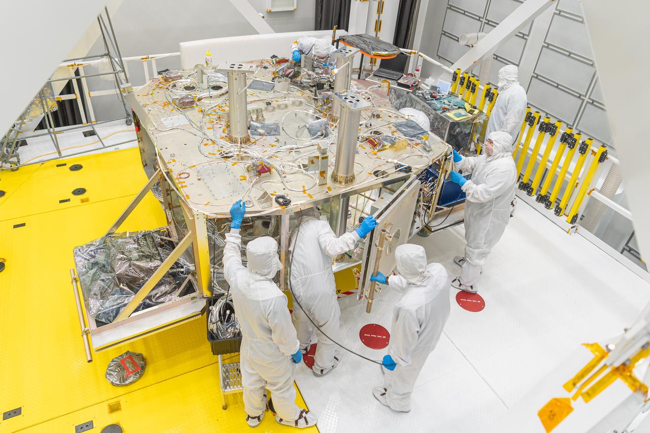 The OSAM-1 integration and testing team deploys and stows the radiator panels on the OSAM-1 servicing payload at Goddard Space Flight Center, Greenbelt Md., Sept 14, 2023. This photo has been reviewed by OSAM1 project management and the Export Control Office and is released for public view. NASA/Mike Guinto