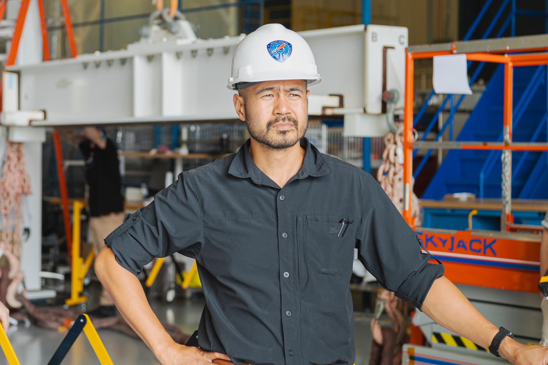Mechanical Integration and Testing Engineer, Jeff Geroso, watches as the OSAM-1 spacecraft arrives at Goddard Space Flight Center, Greenbelt, Md., Sept 20, 2023. Geroso is responsible for the receiving operations involving the OSAM-1 spacecraft bus. This photo has been reviewed by OSAM1 project management and the Export Control Office and is released for public view. NASA/ Mike Guinto