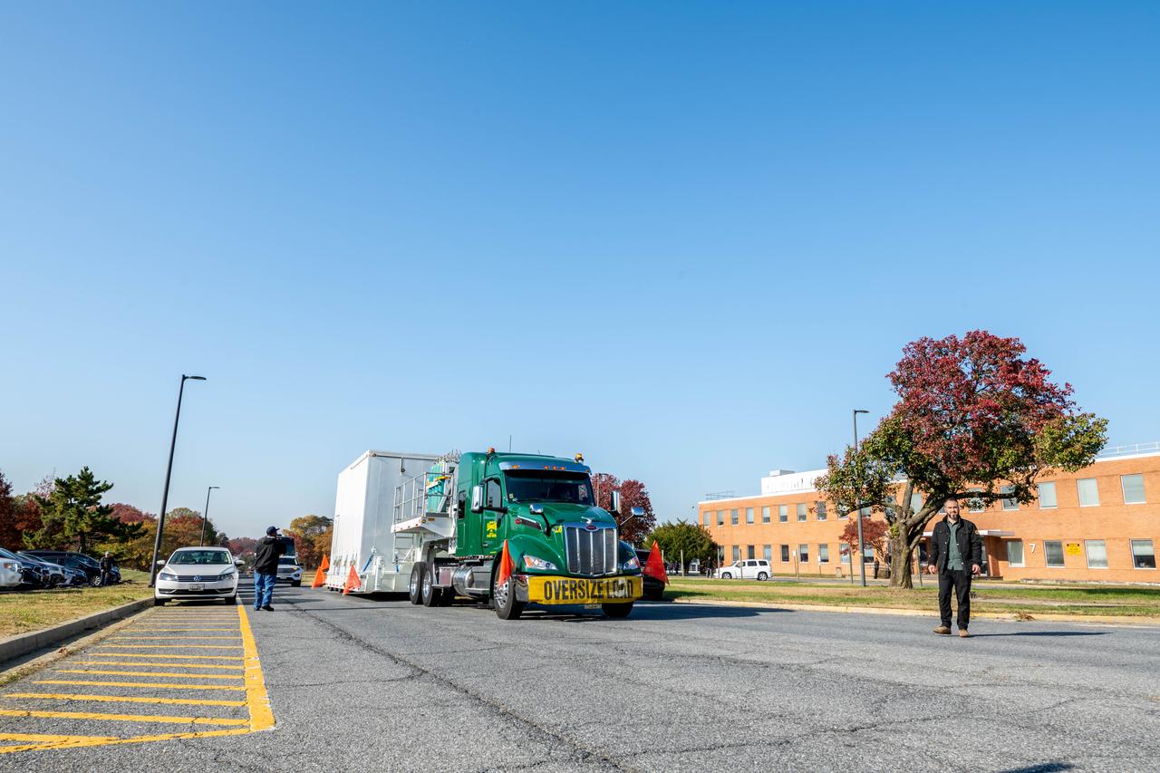 The transport carrier containing NASA’s Plankton, Aerosol, Cloud, ocean Ecosystem (PACE) observatory spacecraft departs NASA’s Goddard Space Flight Center in Greenbelt Maryland on Monday, Nov. 13, 2023. PACE is traveling to Astrotech Space Operations Facility near the agency’s Kennedy Space Center in Florida. PACE is targeted to launch on January 30, 2024, on a SpaceX Falcon 9 rocket lifting off from Space Launch Complex 40 at Cape Canaveral Space Force Station. The PACE observatory will help us better understand how the ocean and atmosphere exchange carbon dioxide, measure key atmospheric variables associated with air quality and Earth's climate, and monitor ocean health, in part by studying phytoplankton, tiny plants and algae that sustain the marine food web.