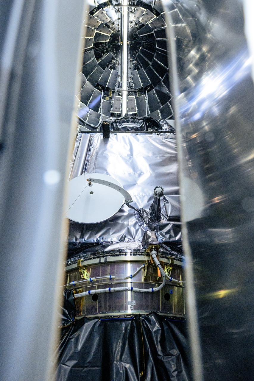NASA and SpaceX technicians safely encapsulate NASA’s PACE (Plankton, Aerosol, Cloud, ocean Ecosystem) spacecraft in SpaceX’s Falcon 9 payload fairings on Monday, Jan. 29, 2024, at the Astrotech Space Operations Facility near the agency’s Kennedy Space Center in Florida. The fairing halves protect the spacecraft from aerodynamic pressure and heating during the ascent phase of launch. PACE is set to launch from Space Launch Complex 40 at Cape Canaveral Space Force Station in Florida no earlier than 1:33 a.m. EST on Tuesday, Feb. 6, 2024.
