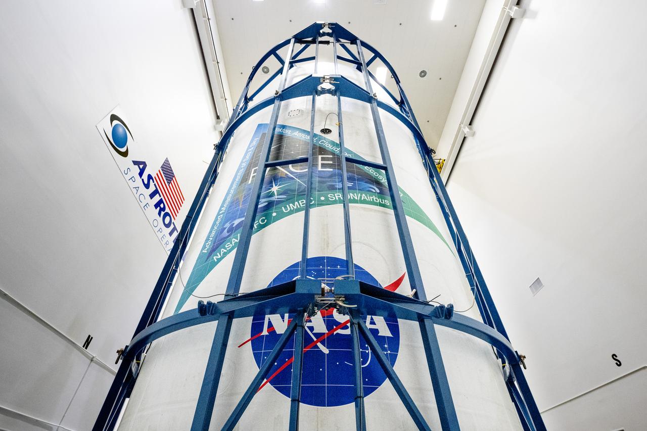 NASA and SpaceX technicians safely encapsulate NASA’s PACE (Plankton, Aerosol, Cloud, ocean Ecosystem) spacecraft in SpaceX’s Falcon 9 payload fairings on Monday, Jan. 29, 2024, at the Astrotech Space Operations Facility near the agency’s Kennedy Space Center in Florida. The fairing halves protect the spacecraft from aerodynamic pressure and heating during the ascent phase of launch. PACE is set to launch from Space Launch Complex 40 at Cape Canaveral Space Force Station in Florida no earlier than 1:33 a.m. EST on Tuesday, Feb. 6, 2024.