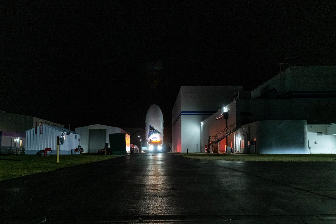 NASA’s PACE (Plankton, Aerosol, Cloud, ocean Ecosystem) spacecraft encapsulated inside SpaceX’s Falcon 9 payload fairings is transported from the Astrotech Space Operations Facility near the agency’s Kennedy Space Center in Florida to Space Launch Complex 40 at Cape Canaveral Space Force Station on Thursday, Feb. 1, 2024, to be mated with a SpaceX Falcon 9 in preparation for liftoff set for no earlier than 1:33 a.m. EST on Tuesday, Feb. 6, 2024. PACE is NASA’s newest earth-observing satellite that will help increase our understanding of Earth’s oceans, atmosphere, and climate by delivering hyperspectral observations of microscopic marine organisms called phytoplankton as well new data on clouds and aerosols.