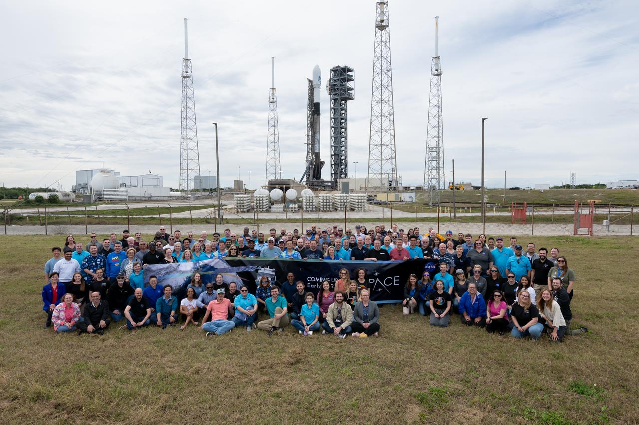 Members of the PACE (Plankton, Aerosol, Cloud, ocean Ecosystem), OCI (The Ocean Color Instrument), HARP2, and SpexONE teams pose with the PACE Spacecraft atop a SpaceX Falcon 9 rocket from Space Launch Complex 40 at Cape Canaveral Space Force Station in Florida at 1:33 a.m. EST Thursday, Feb. 8. PACE is NASA’s newest earth-observing satellite that will help increase our understanding of Earth’s oceans, atmosphere, and climate by delivering hyperspectral observations of microscopic marine organisms called phytoplankton, as well new data on clouds and aerosols.