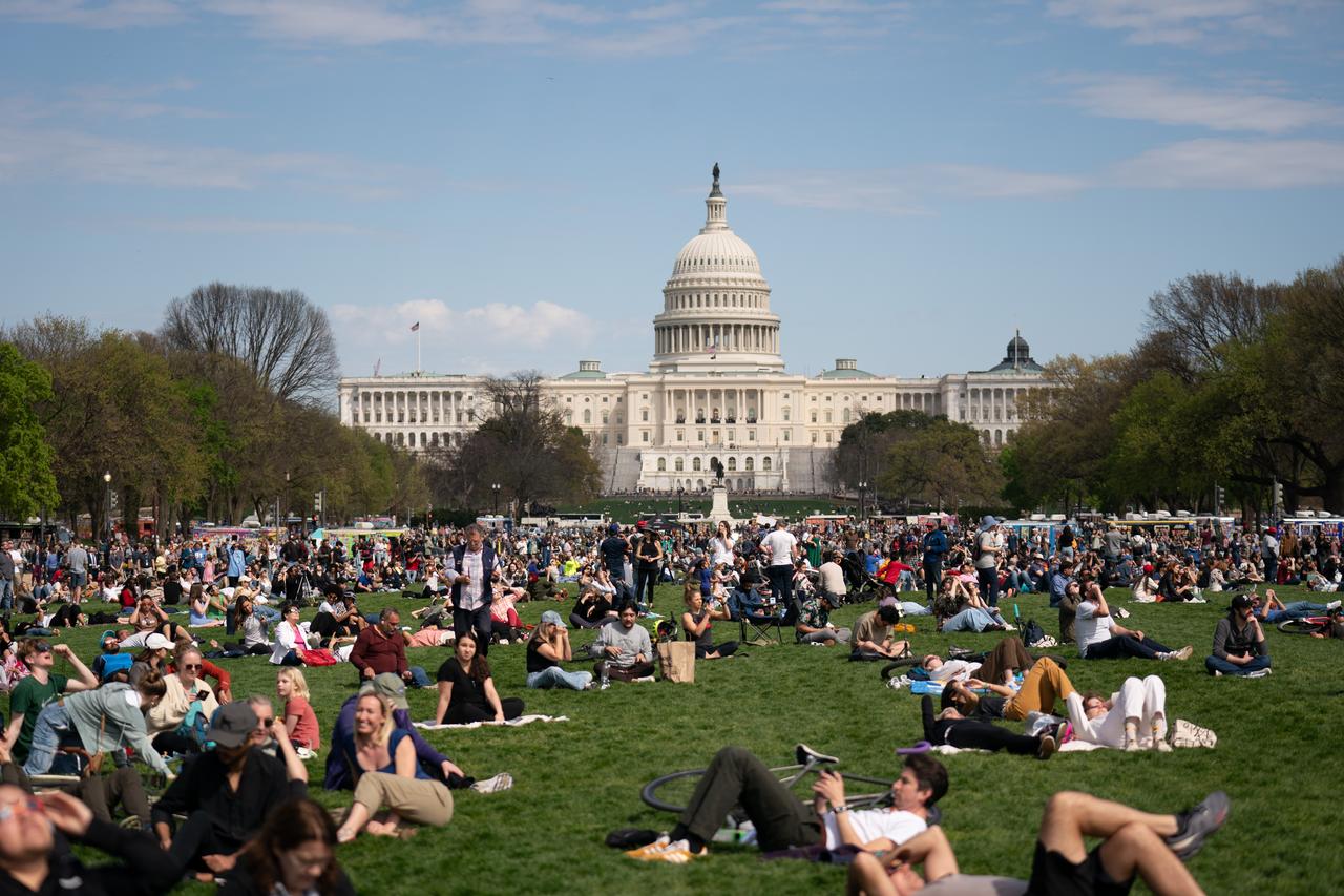 The Solar Eclipse Festival on the National Mall during a partial solar eclipse in Washington, DC, Monday, April 8, 2024. A total solar eclipse swept across a narrow portion of the North American continent from Mexico’s Pacific coast to the Atlantic coast of Newfoundland, Canada. A partial solar eclipse was visible across the entire North American continent along with parts of Central America and Europe. Photo Credit: (NASA/Denny Henry)