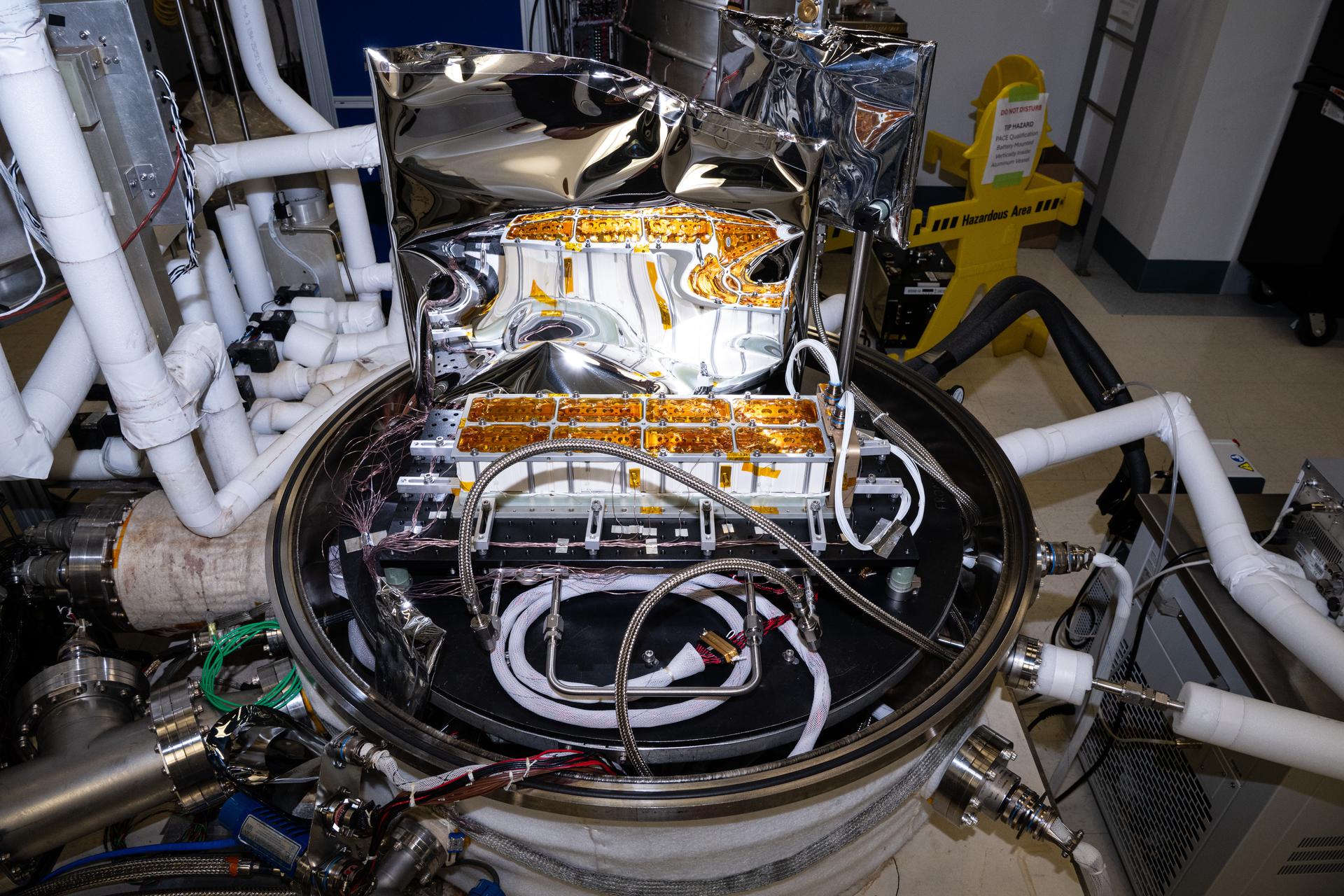 The Lunar Environment Monitoring Station (LEMS) flight battery is installed for testing in a thermal vacuum chamber at Goddard Space Flight Center, Greenbelt Md., October 8th, 2025.. LEMS is a compact, autonomous, and self-sustaining seismometer suite designed to carry out continuous, long-term, monitoring of the lunar seismic environment at the South Polar region. Photo Credit: NASA/Denny Henry