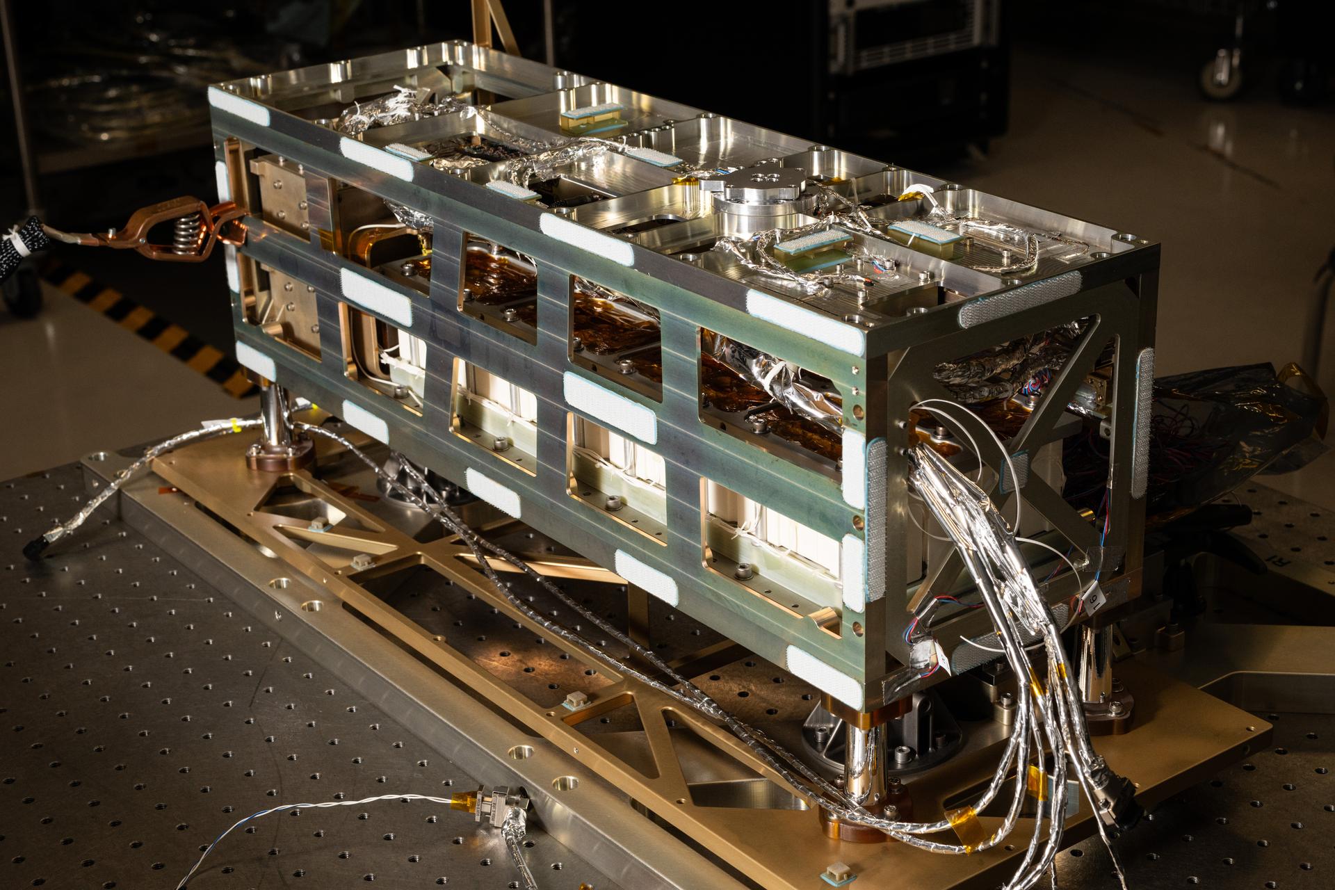 A detail view of the Lunar Environment Monitoring Station, (LEMS) bus prior to thermal blanket installation inside the cleanroom at Goddard Space Flight Center, Greenbelt Md., Jan 12, 2026. LEMS is a compact, autonomous, and self-sustaining seismometer suite designed to carry out continuous, long-term, monitoring of the lunar seismic environment at the South Polar region. Photo Credit: NASA/Denny Henry