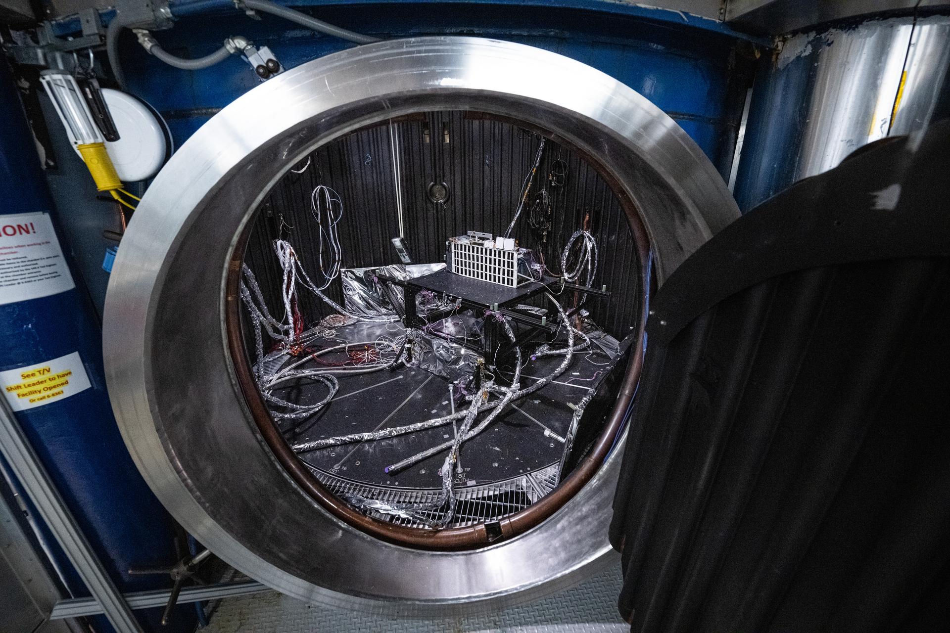 The Lunar Environment Monitoring Station (LEMS) instrument is installed for testing in a thermal vacuum chamber at Goddard Space Flight Center, Greenbelt Md., March 30, 2026. LEMS is a compact, autonomous, and self-sustaining seismometer suite designed to carry out continuous, long-term, monitoring of the lunar seismic environment at the South Polar region. Photo Credit: NASA/Denny Henry