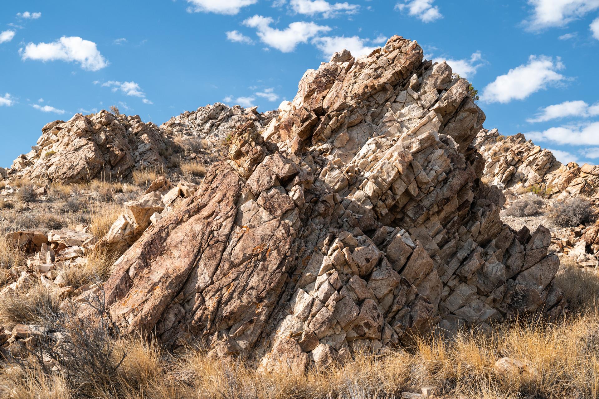 Detailed view of a granite outcrop at Crater Island, Utah on June 23, 2026. This outcropping was one of the points of interest to NASA's DAVINCI VADIX Mission for its distinct geologic properties. NASA/Mike Guinto