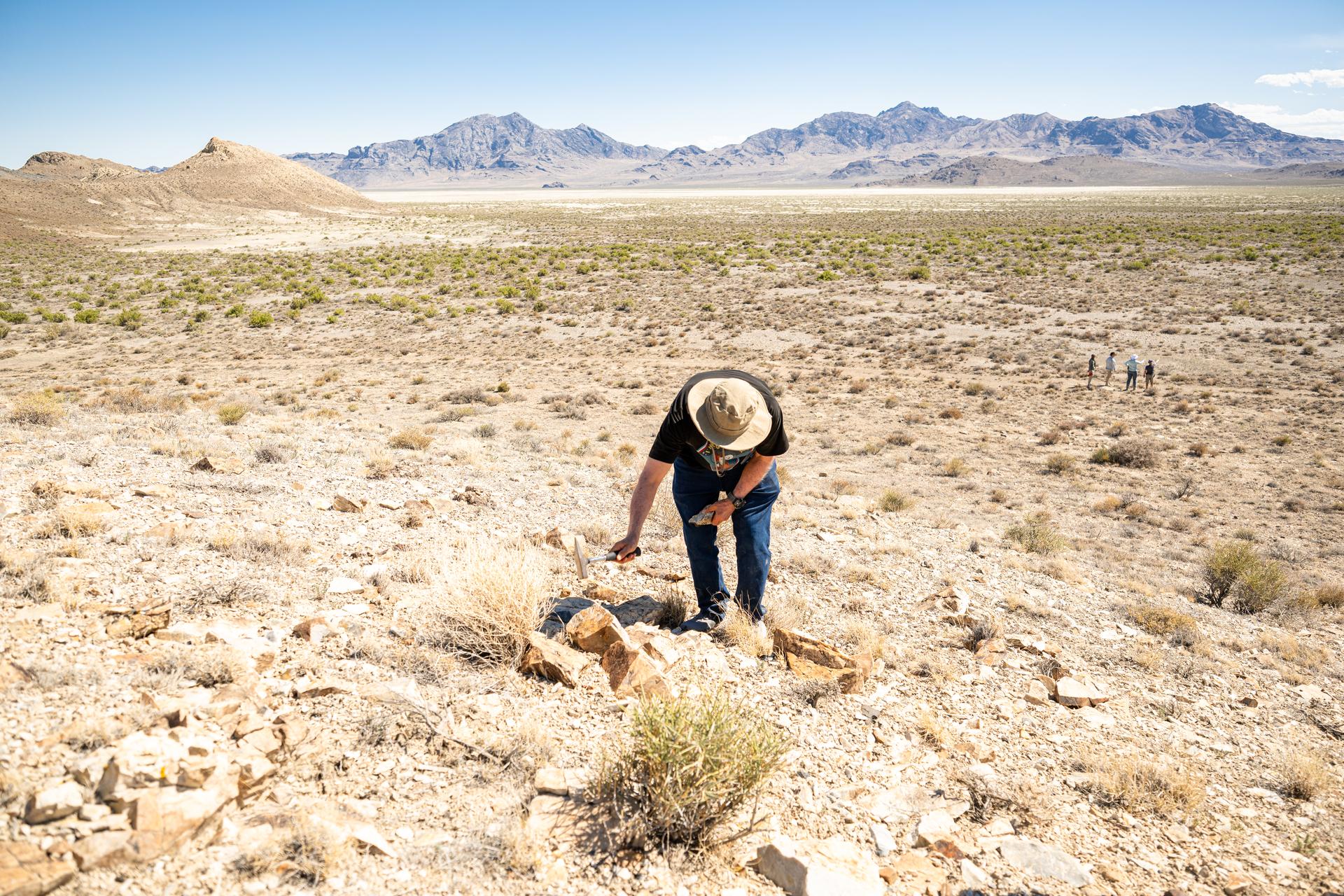 Dr. Jim Garvin, mission principal investigator,collect samples of rocks found at Crater Island, Utah on June 23, 2026. These samples become the "ground truth" for the measurements from the VADIX prototype camera system which flew over the crater island site, taking photos and measurements from the air. NASA/Mike Guinto