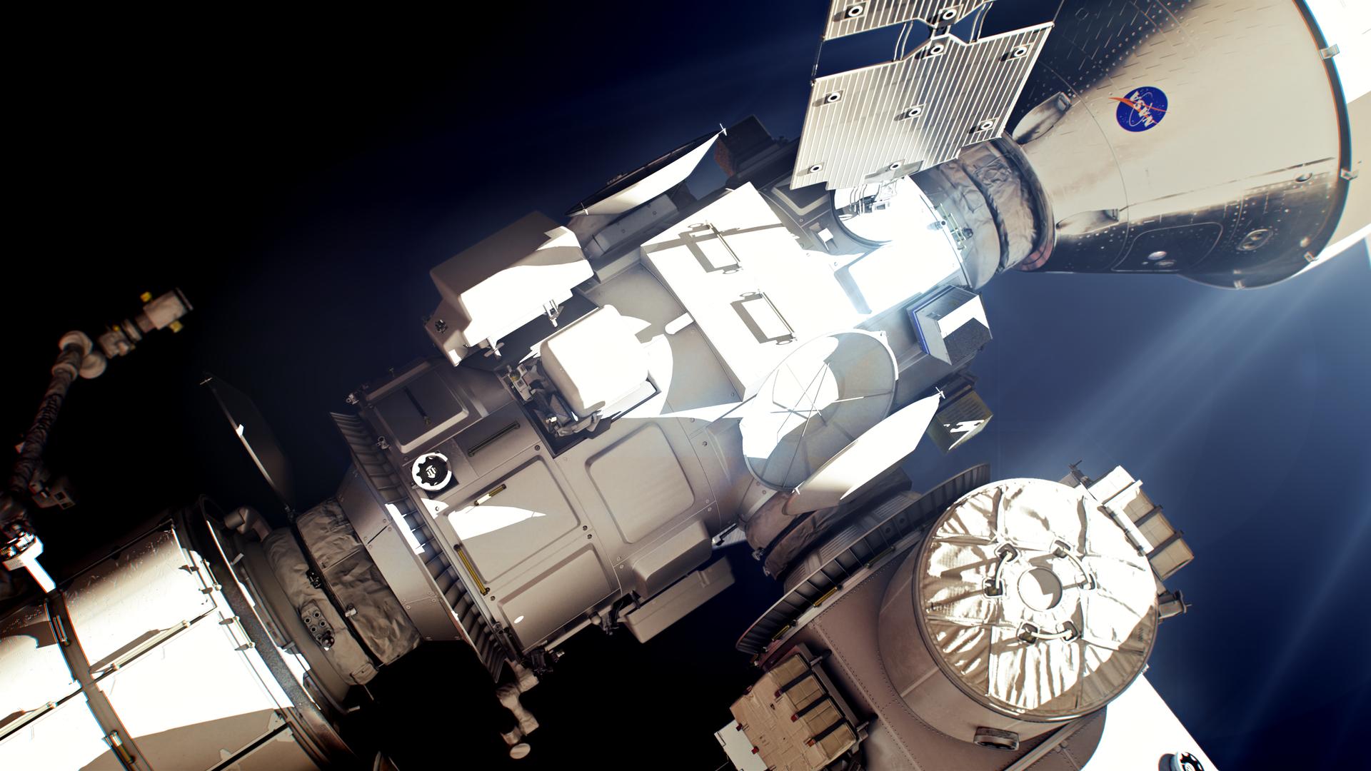 This artist’s rendering of Gateway’s Lunar I-Hab module shows a detailed view of the element with Orion attached. The module and spacecraft are illuminated against the backdrop of outer space.