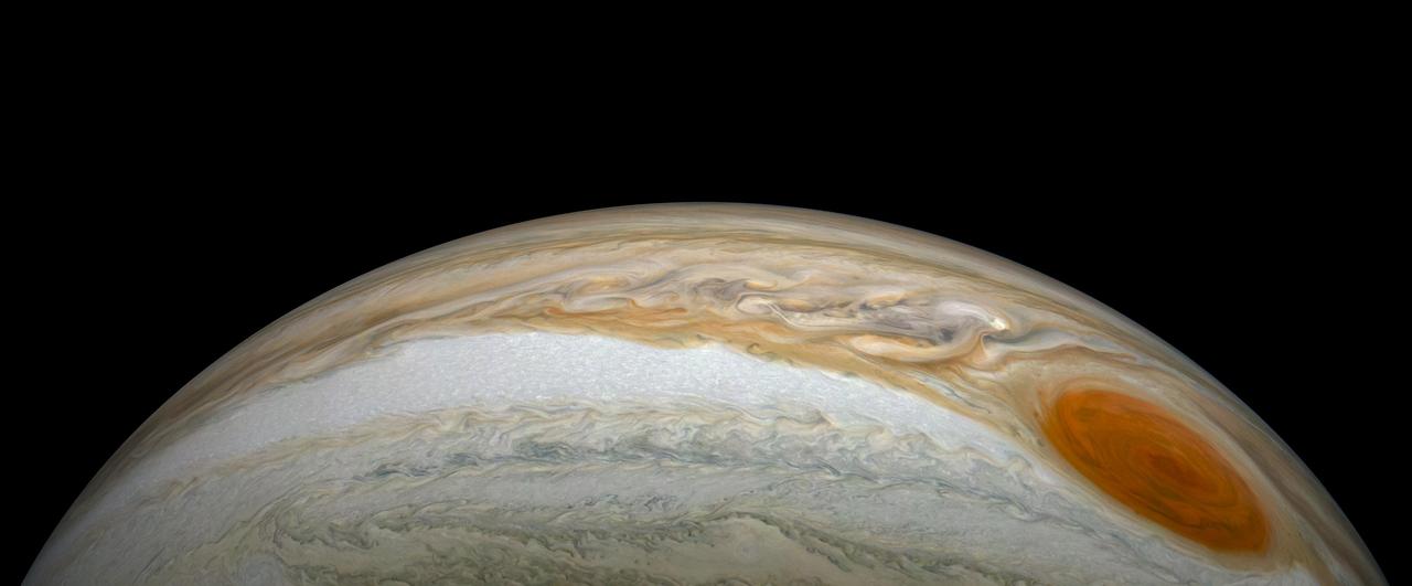 NASA's Juno spacecraft saw this striking vista during its most recent close flyby of Jupiter. This view highlights the contrast between the colorful South Equatorial Belt and the mostly white Southern Tropical Zone, a latitude that also features Jupiter's most famous phenomenon, the persistent, anticyclonic storm known as the Great Red Spot.  Citizen scientist Kevin M. Gill created this image using data from the spacecraft's JunoCam imager. The raw image was taken on July 20, 2019, at 9:37 p.m. PDT (July 21, 2019, at 12:37 a.m. EDT) as the Juno spacecraft performed its 21st close flyby of Jupiter. At the time the image was taken, the spacecraft was 26,697 miles (42,965 kilometers) from the tops of the clouds, above a latitude of 46 degrees south. Enhanced image by Kevin M. Gill (CC-BY) based on images provided courtesy of NASA/JPL-Caltech/SwRI/MSSS.