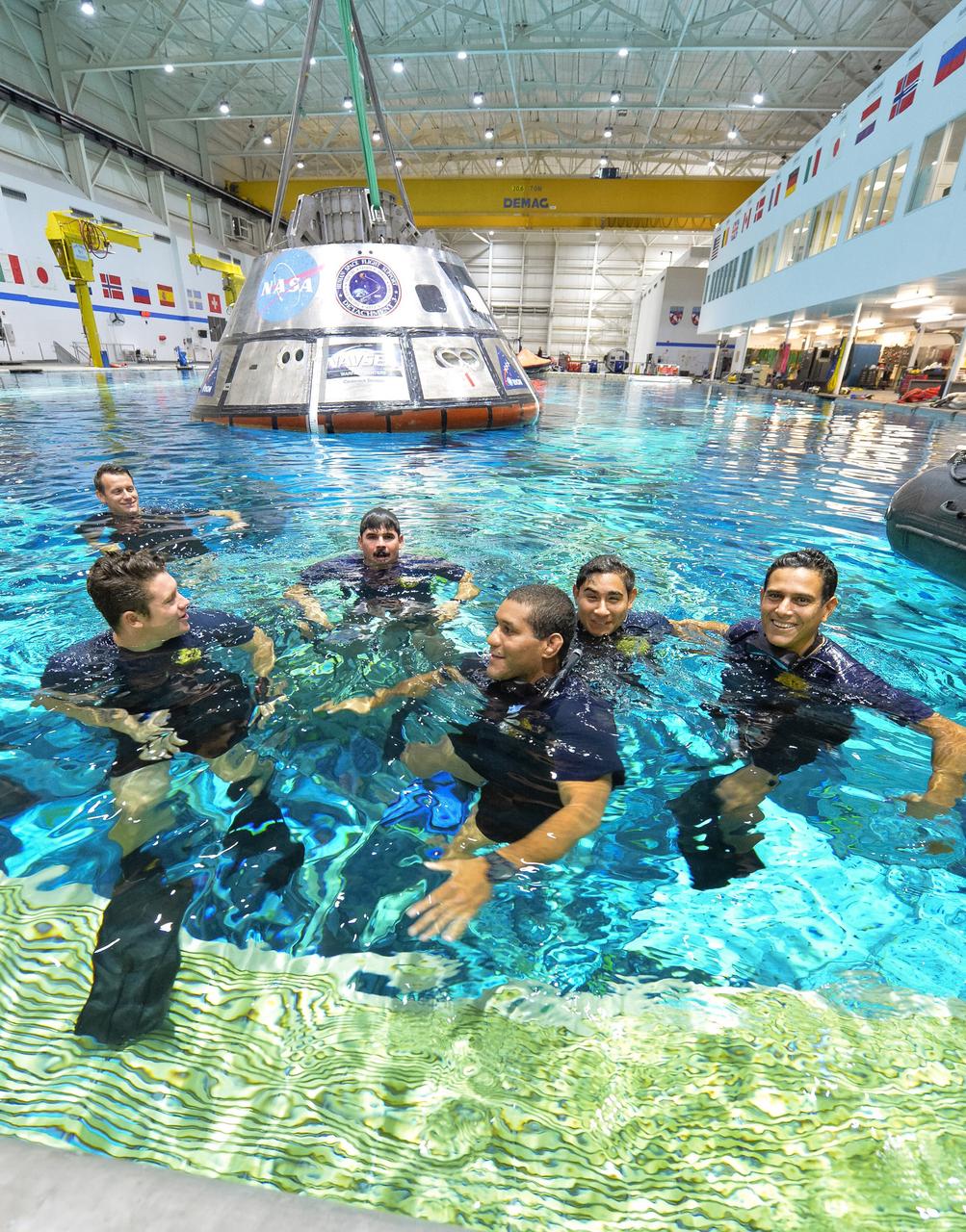 U.S. Navy divers are training in the Neutral Buoyancy Laboratory at NASA’s Johnson Space Center in Houston. Navy divers, Air Force pararescuemen and Coast Guard rescue swimmers practice Orion underway recovery techniques using a test version of the Orion spacecraft. Training will help the team prepare for Underway Recovery Test 5 for Exploration Mission 1 aboard the USS San Diego in the Pacific Ocean off the coast of California in October. The Ground Systems Development and Operations Program, along with the U.S. Navy and Lockheed Martin, are preparing the recovery team, hardware and operations to support EM-1 recovery. 