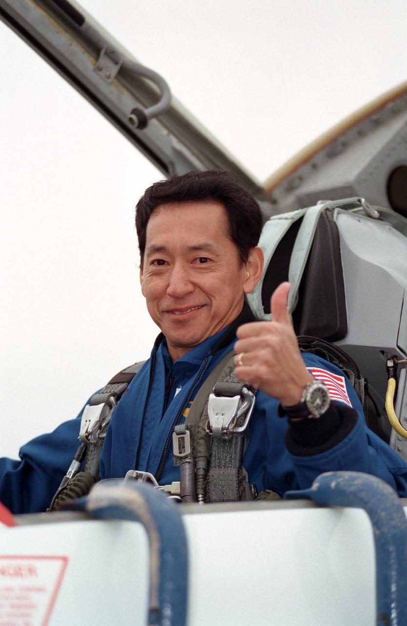 JSC2000-00923 (27 January 2000) ---  Astronaut Mamoru Mohri, representing Japan's National Space Development Agency (NASDA), gives a thumbs up signal prior to departure in a T-38 from Ellington Field, destination Florida.  Five other astronauts, including one from the European Space Agency (ESA),   are scheduled to liftoff into space aboard the Space Shuttle Endeavour next week.