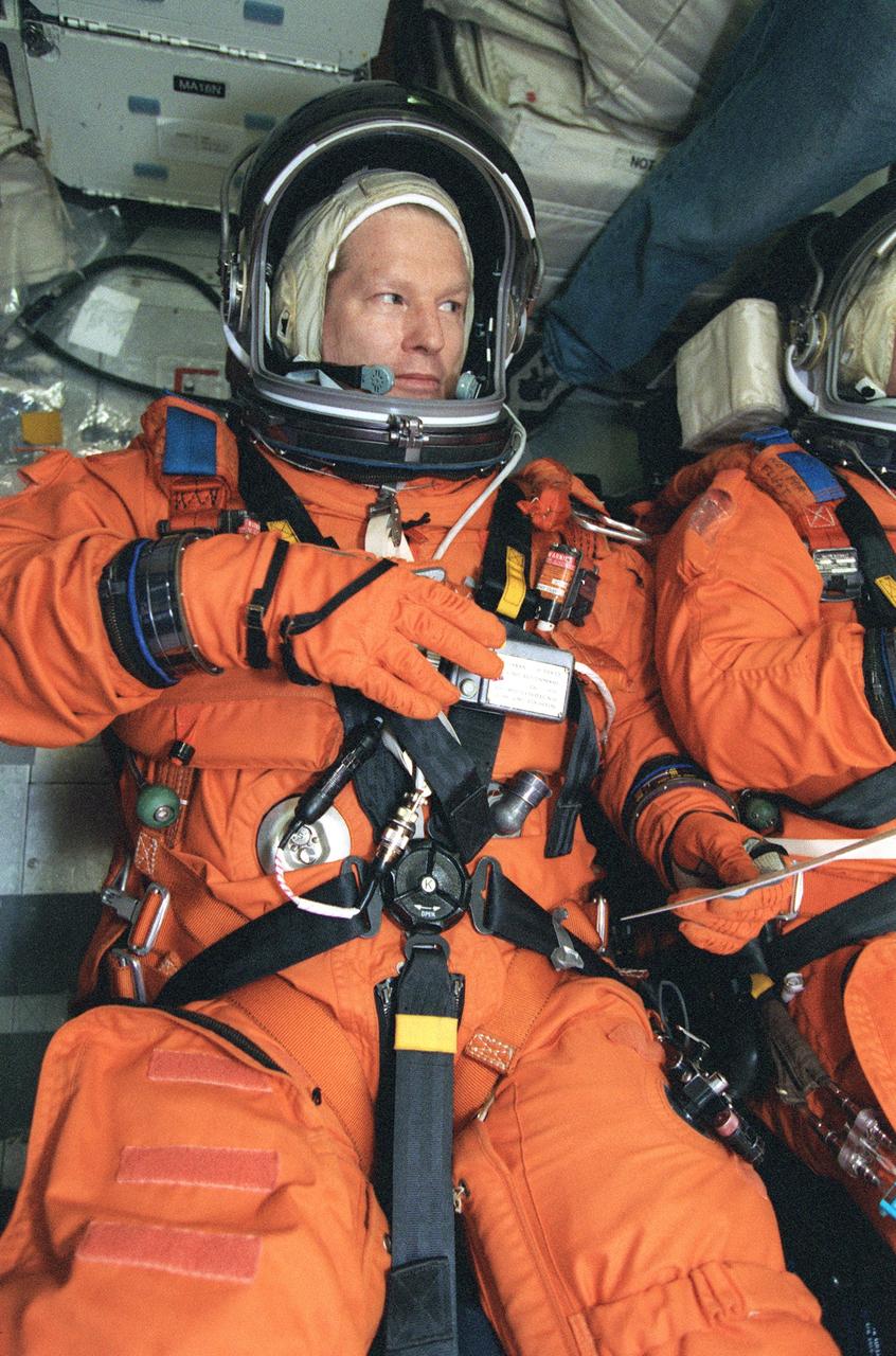 JSC2000-04075 (12 May 2000) --- Astronaut William Shepherd, Expedition One mission commander, lies on a couch on the mid deck of a Johnson Space Center trainer during a rehearsal of shuttle descent. Shepherd and his Expedition One crewmates will return from their stay aboard ISS in the Space Shuttle Discovery around mid February 2001.