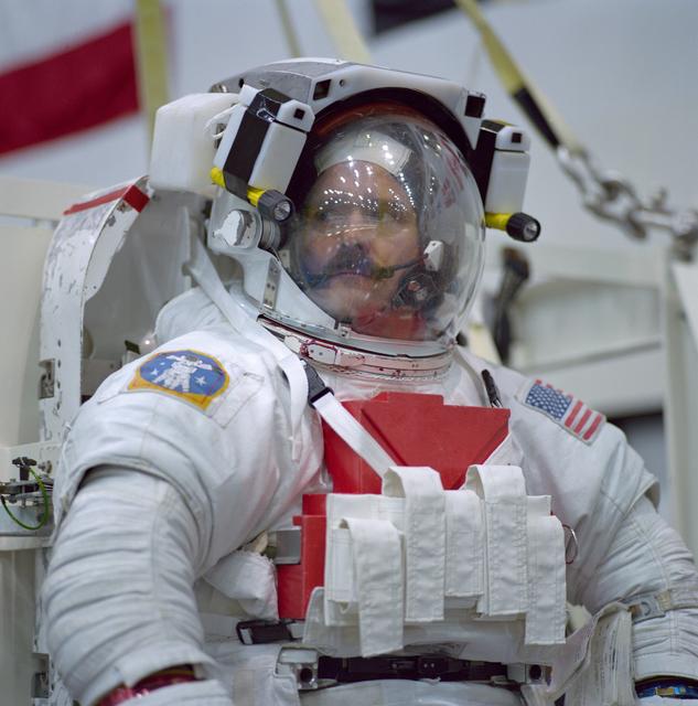 NASA image: STS-100 crewmembers prepare to train in NBL