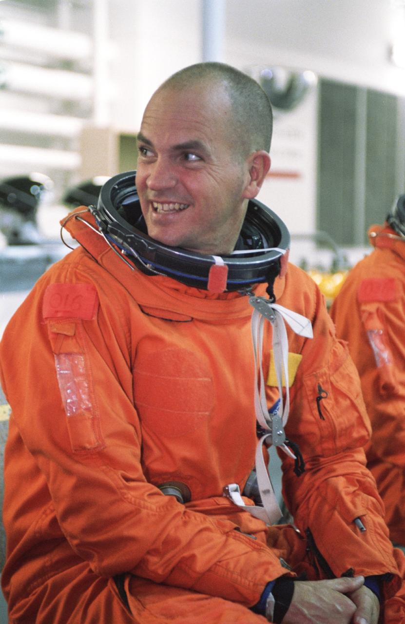JSC2000-07461 (11 December 2000) --- Astronaut Frederick W. Sturckow, STS-105 pilot, attired in a training version of the shuttle launch and entry garment, awaits the start of an emergency bailout training session at the Neutral Buoyancy Laboratory (NBL) near Johnson Space Center (JSC). This summer, Sturckow will join four other astronauts and two cosmonauts for a mission to the International Space Station (ISS).