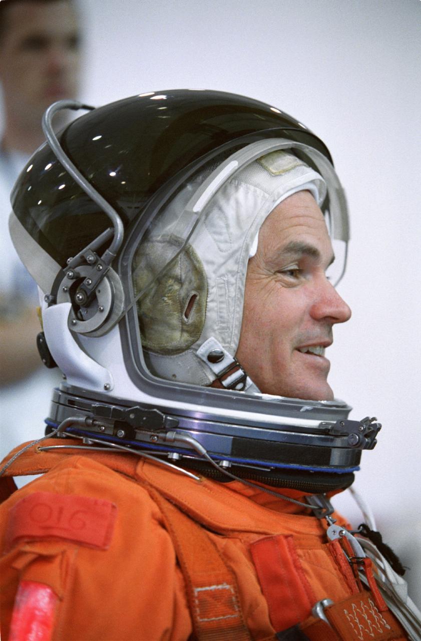 JSC2000-07464 (11 December 2000) --- Astronaut Frederick W. Sturckow, STS-105 pilot, attired in a training version of the shuttle launch and entry garment, awaits the start of an emergency bailout training session at the Neutral Buoyancy Laboratory (NBL) near Johnson Space Center (JSC).