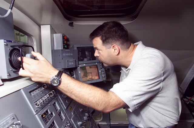 NASA image: Views of STS-106 Pilot Scott Altman training with the RMS arm