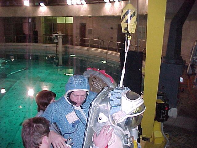 JSC2000-E-20603 (February 2000) --- Astronaut William M. Shepherd, Expedition One commander, prepares to don an Orlan space suit in order to rehearse a spacewalk in the Hydrolab facility at the Gagarin Cosmonaut Training Center in Star City, Russia.