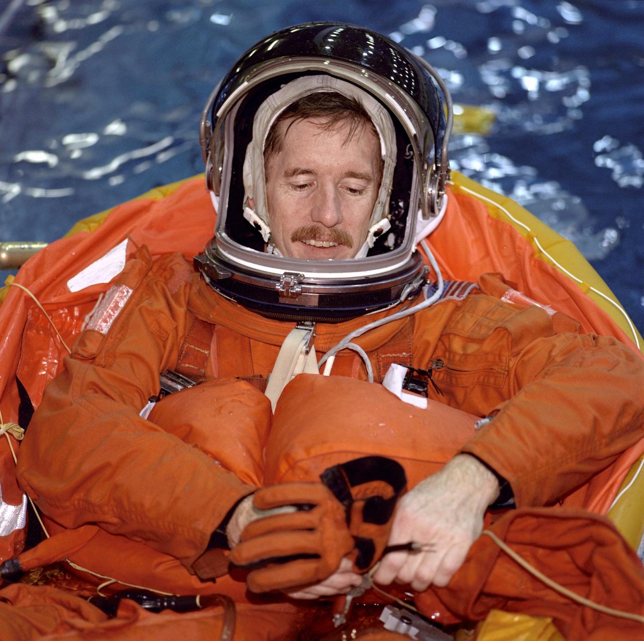 JSC2001-00010 (January 2001) --- Astronaut James F. Reilly, STS-104 mission specialist, floats in a small life raft during an emergency egress training session at the Neutral Buoyancy Laboratory (NBL) near the Johnson Space Center (JSC). Reilly will join four other astronauts for a June mission to the International Space Station (ISS).