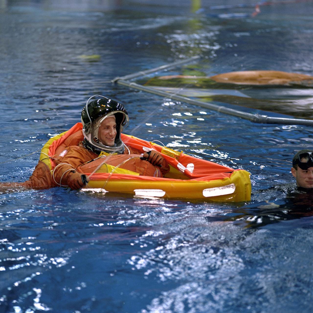 JSC2001-00012 (January 2001) --- Astronaut Charles O. Hobaugh, STS-104 pilot, floats in a small life raft during an emergency egress training session at the Neutral Buoyancy Laboratory (NBL) near the Johnson Space Center (JSC). Hobaugh will join four other astronauts for a June mission to the International Space Station (ISS).