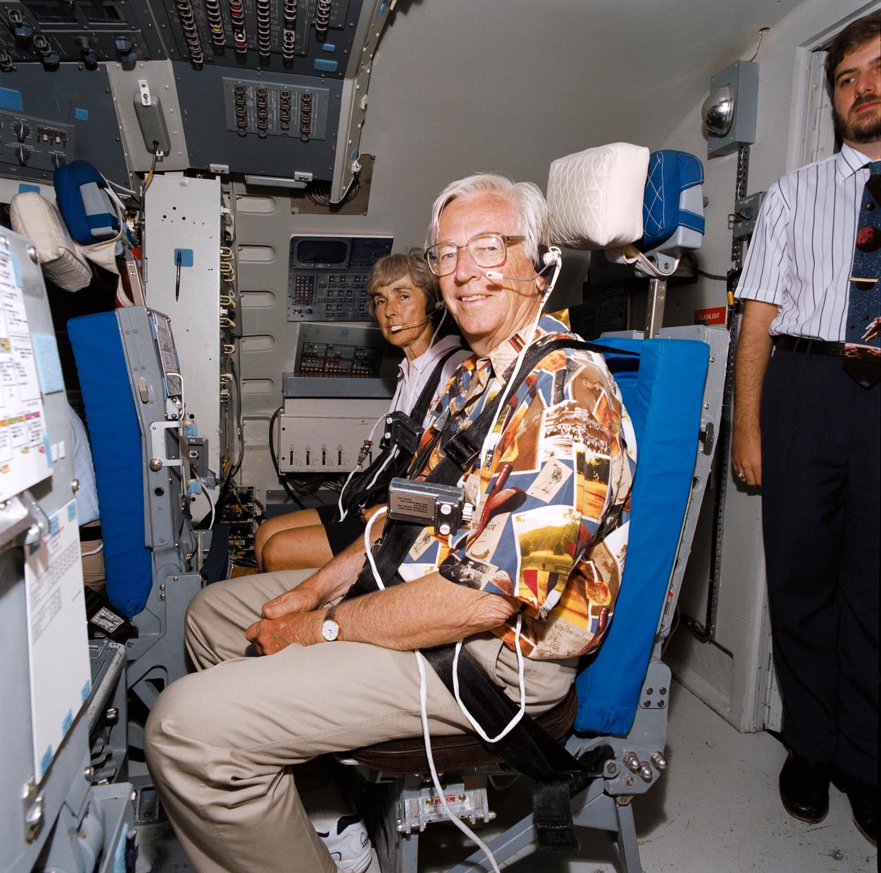 Charles Schulz Memorial Library.  View of unidentified individual in cockpit area (02834 thru 02835); and   View of unidentified individuals in cockpit area (02836).