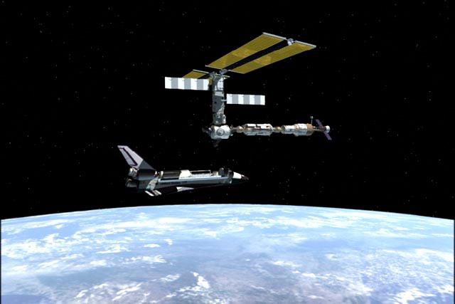 JSC2001-E-00356 (January 2001) --- Artist's rendering of early STS-98/ISS 5A with the Space Shuttle Atlantis in view during rendezvous and docking operations.