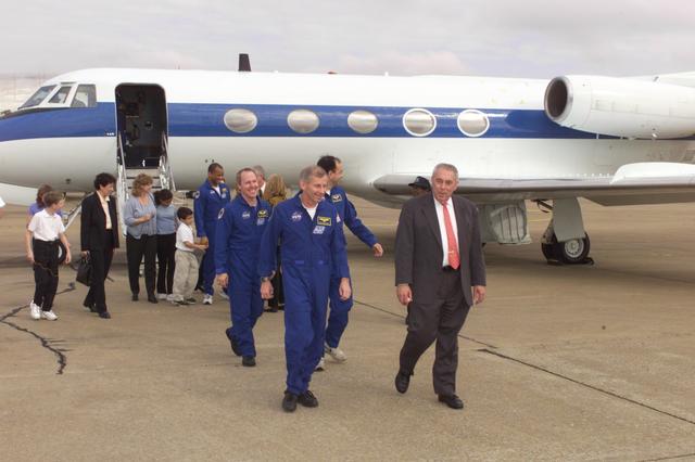 NASA image: Photographic documentation of the return of the STS-98 crew to Ellington Field