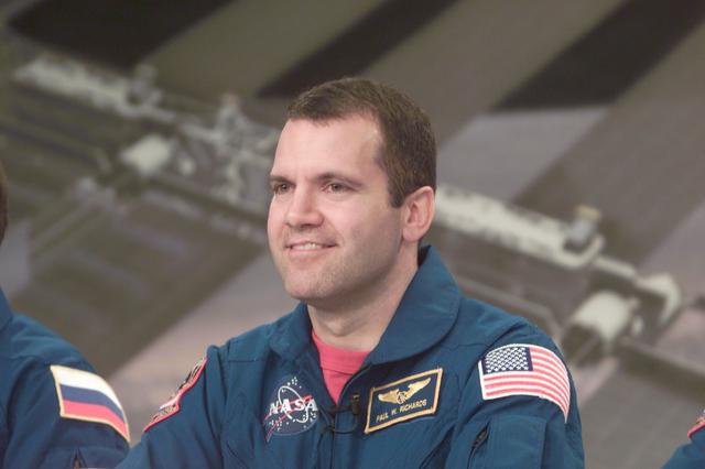 JSC2001-E-05529 (28 February 2001) ---  Astronaut Paul W. Richards, STS-102 mission specialist, responds to a news representative's question during a press briefing at the Johnson Space Center (JSC).