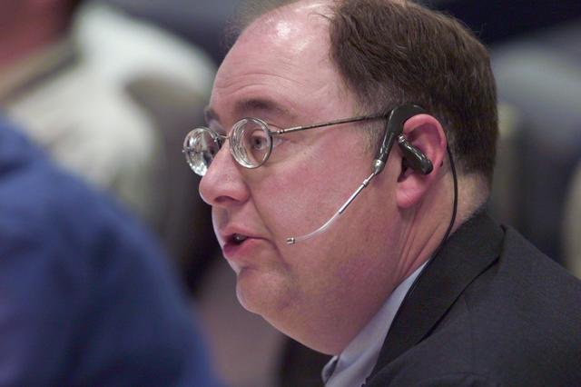 JSC2001-E-06208 (8 March 2001) --- At his console in Houston's Mission Control Center, ascent flight director Wayne Hale monitors Discovery's pre-launch activities several hundred miles away in Florida on STS-102 launch day.