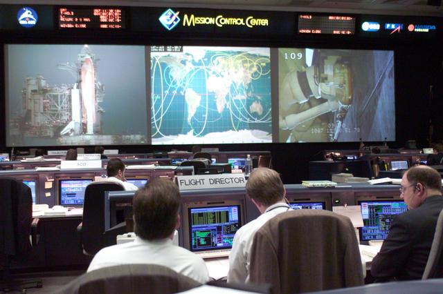 JSC2001-E-06210 (8 March 2001) --- As STS-102 Discovery liftoff countdown proceeds at the Kennedy Space Center (KSC)in Florida, flight controllers in Houston follow the progress at their assigned consoles. Ascent flight director Wayne Hale views his monitor at right.