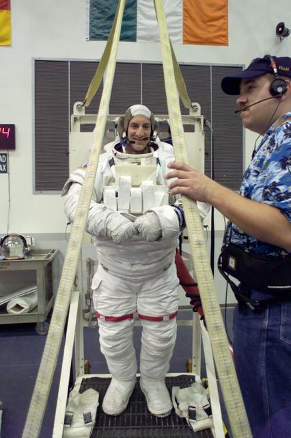 JSC2001-E-10917 (13 April 2001) --- Astronaut Charles O. Hobaugh, pilot, training for extravehicular activity (EVA), prepares to enter a deep pool of the Neutral Buoyancy Laboratory (NBL) at the Johnson Space Center (JSC). The STS-104 mission to the International Space Station (ISS) represents the Space Shuttle Atlantis' first flight using a new engine and is targeted for a liftoff no earlier than June 14, 2001.