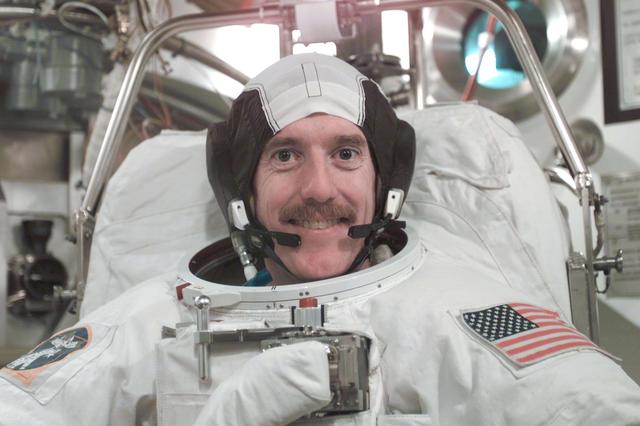 NASA image: STS-104 Crew Training of Jim Reilly in EMU fit check