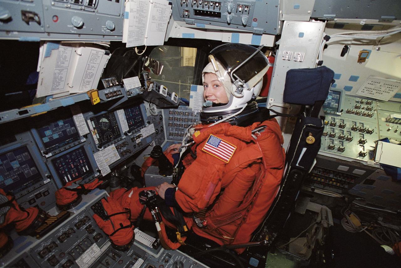 JSC2002-00794 (12 April 2002) --- Astronaut Pamela A. Melroy, STS-112 pilot, occupies the pilot&#0146;s station during a mission training session in the Space Vehicle Mockup Facility at the Johnson Space Center (JSC). Melroy is attired in a training version of the shuttle launch and entry suit. STS-112 will be the 15th shuttle mission to visit the International Space Station (ISS).