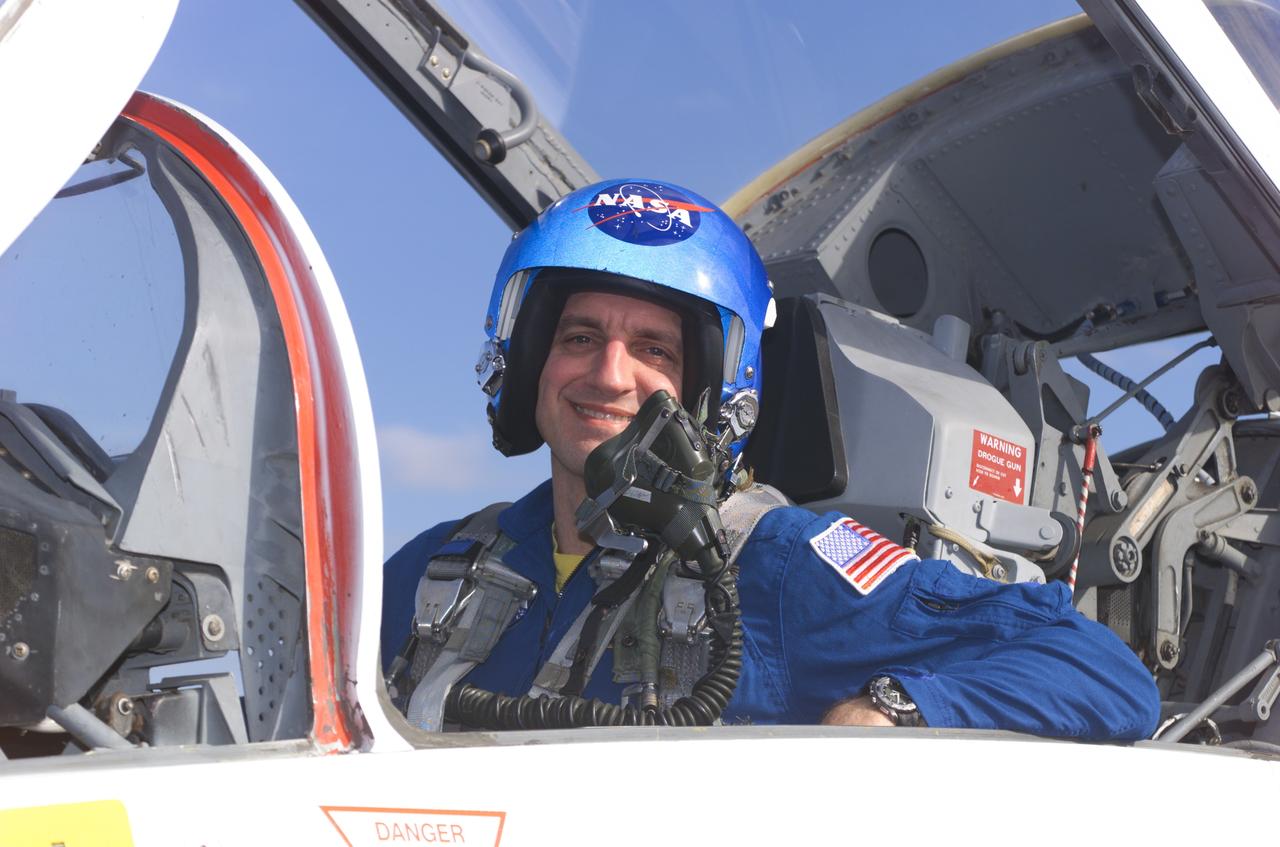 JSC2002-E-01742 (16 January 2002) --- Astronaut Richard M. Linnehan, STS-109 mission specialist, photographed in a T-38 trainer jet, prepares for a flight at Ellington Field near Johnson Space Center (JSC).