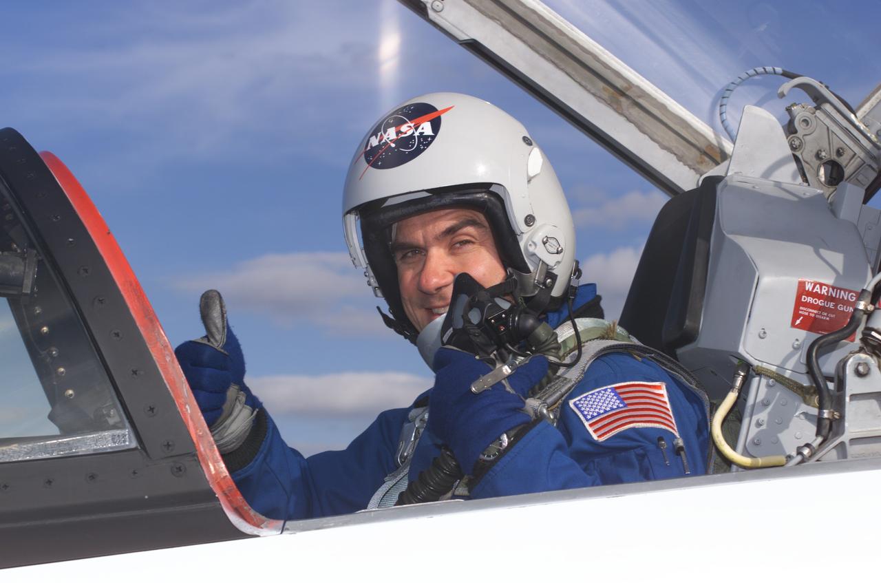 JSC2002-E-01743 (16 January 2002) --- Astronaut Duane G. Carey, STS-109 pilot, photographed in a T-38 trainer jet, prepares for a flight at Ellington Field near Johnson Space Center (JSC).