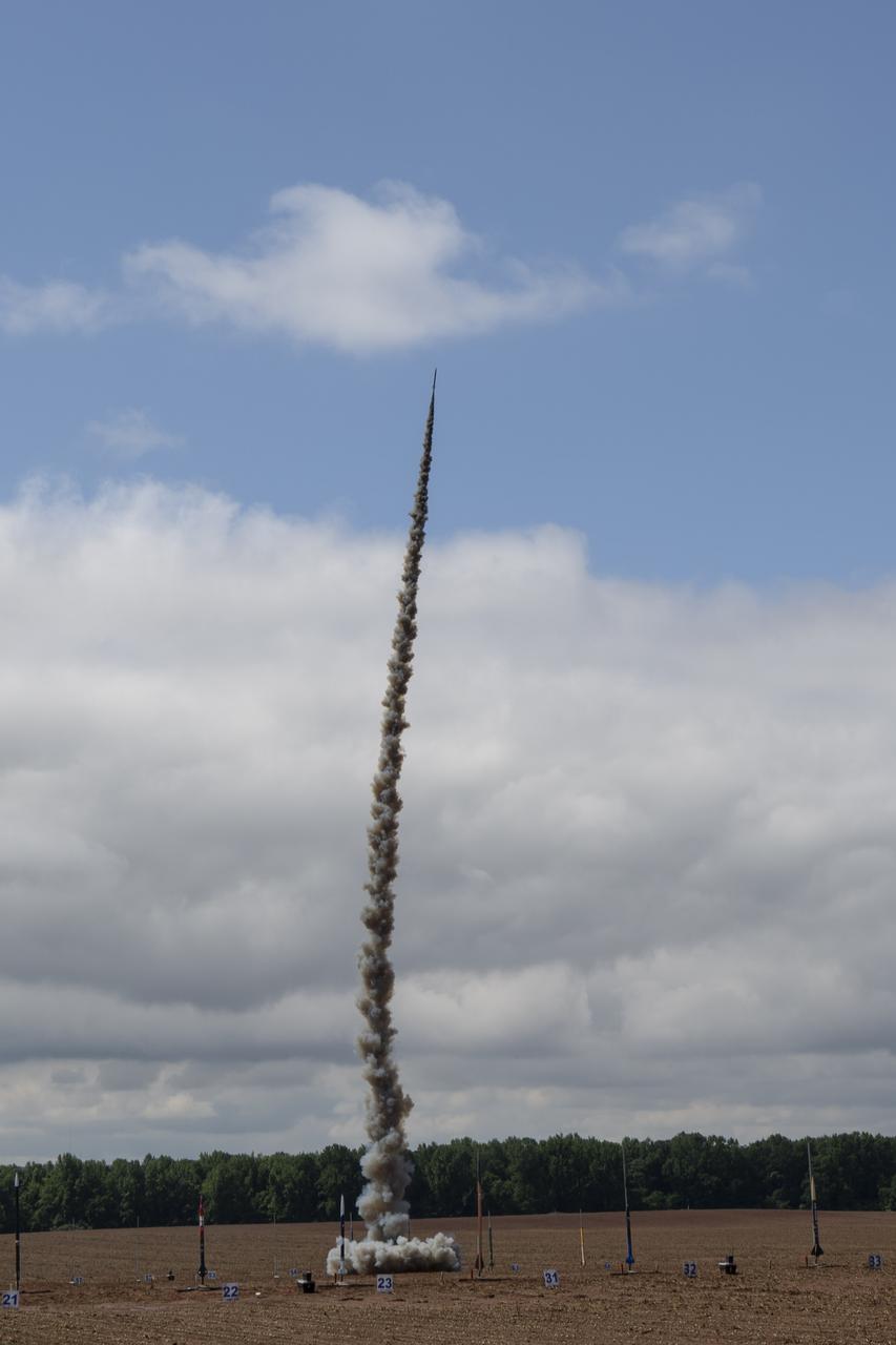 Over than 980 middle school, high school, and college students from across the nation launched more than 40 high-powered rockets just north of NASA’s Marshall Space Flight Center in Huntsville, Alabama. This year marked the 25th anniversary of the competition. To compete, students follow the NASA engineering design lifecycle by going through a series of reviews for nine months leading up to launch day.   Each year, a payload challenge is issued to the university teams, and this year’s task took inspiration from the agency’s Artemis missions, where NASA will send astronauts to explore the Moon for scientific discovery, economic benefit, and to build the foundation for the first crewed missions to Mars. Teams were challenged to include “reports” from STEMnauts, non-living objects representing astronauts. The STEMnaut “crew” had to relay real-time data to the student team’s mission control, just as the Artemis astronaut crew will do as they explore the lunar surface.    To learn more, visit: www.nasa.gov/studentlaunch.  