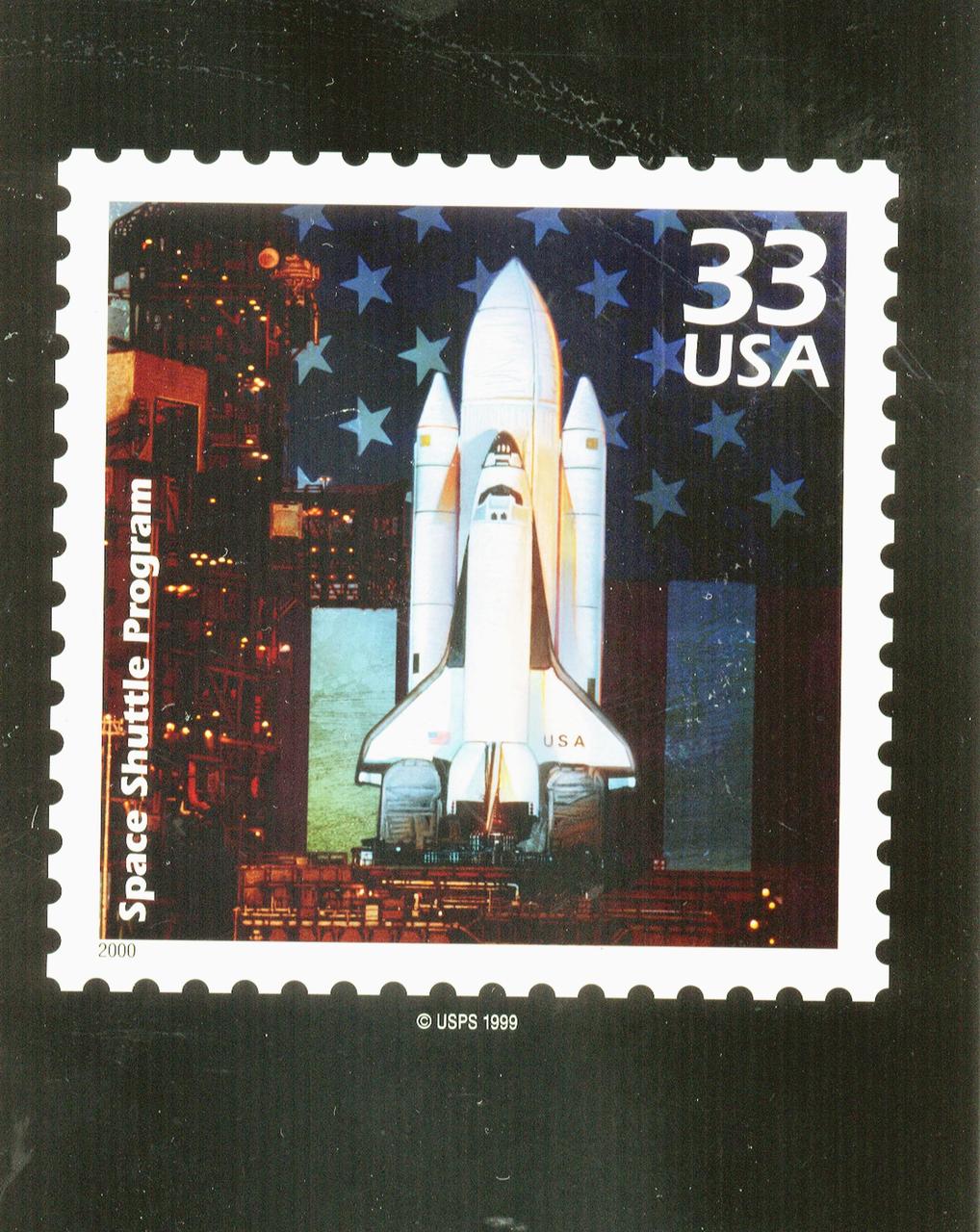 One of a new series of U.S. Postage stamps, The 1980s, is unveiled at the KSC Visitors Complex. The stamp, shown here, is the Space Shuttle Columbia, first launched in April 1981. This collection of stamps is the ninth in the Post Office's &quot;Celebrate the Century&quot; commemorative series honoring the last 100 years of American history. Taking part in the &quot;First Day of Issue Ceremony&quot; were astronaut Richard Linnehan, U.S. Representative, 15th Congressional District, Dave Weldon, U.S. Postal Service District Manager Viki Brennan, Center Director Roy Bridges and President of the Visitor Complex Rick Abramson