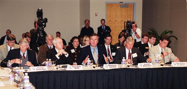 Participants in the First Florida Space Summit take part in a discussion on the future of space as it relates to the State of Florida. Held at the Kennedy Space Center Visitor Complex, the discussion was moderated by Center Director Roy Bridges. Seated (left to right) are Senator Connie Mack, NASA Administrator, Governor Jeb Bush, Senator Bob Graham and Representative Dave Weldon. The event also included 45th Space Wing Commander Brig. Gen. Donald Pettit and heads of aerospace companies