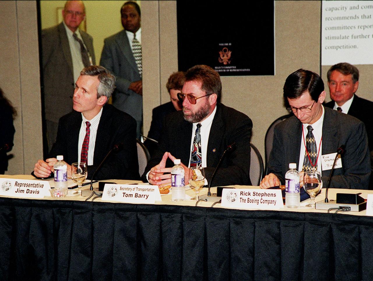 Participants in the First Florida Space Summit take part in a discussion on the future of space as it relates to the State of Florida. The discussion, held at the Kennedy Space Center Visitor Complex, was moderated by Center Director Roy Bridges. Seated (left to right) are Representative Jim Davis, Secretary of Transportation Tom Barry and Rick Stephens, who represented The Boeing Company. The event also included Senator Bob Graham, Senator Connie Mack, Representative Dave Weldon, 45th Space Wing Commander Brig. Gen. Donald Pettit and heads of aerospace companies