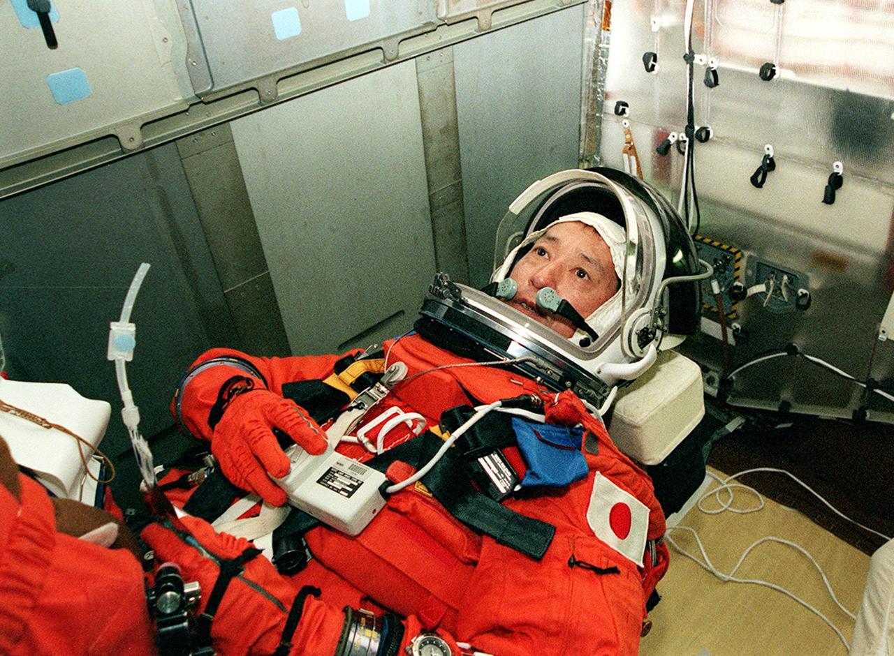 STS-99 Mission Specialist Mamoru Mohri (Ph.D.) takes his seat inside Space Shuttle Endeavour for a practice launch countdown during Terminal Countdown Demonstration Test (TCDT) activities for the mission. Mohri is with the National Space Development Agency (NASDA) of Japan. The TCDT includes a simulation of the final launch countdown. STS-99 is the Shuttle Radar Topography Mission, which will chart a new course, using two antennae and a 200-foot-long section of space station-derived mast protruding from the payload bay to produce unrivaled 3-D images of the Earth's surface. The result of the Shuttle Radar Topography Mission could be close to 1 trillion measurements of the Earth's topography. Besides contributing to the production of better maps, these measurements could lead to improved water drainage modeling, more realistic flight simulators, better locations for cell phone towers, and enhanced navigation safety. Launch of Endeavour on the 11-day mission is scheduled for Jan. 31 at 12:47 p.m. EST