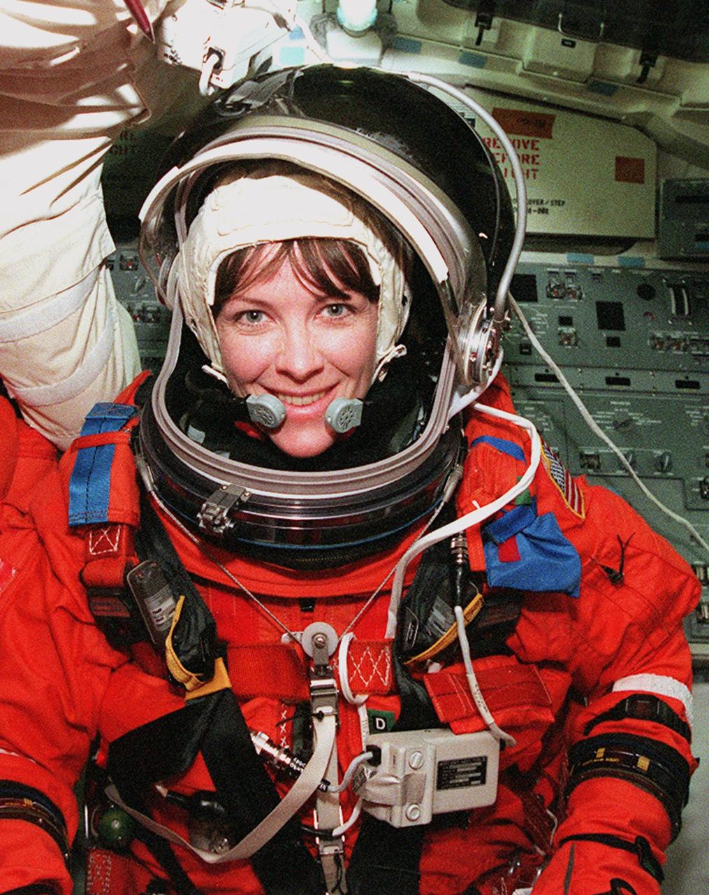 STS-99 Mission Specialist Janet Lynn Kavandi (Ph.D.) settles into her seat inside Space Shuttle Endeavour during Terminal Countdown Demonstration Test (TCDT) activities for the mission. The TCDT includes a simulation of the final launch countdown. STS-99 is the Shuttle Radar Topography Mission, which will chart a new course, using two antennae and a 200-foot-long section of space station-derived mast protruding from the payload bay to produce unrivaled 3-D images of the Earth's surface. The result of the Shuttle Radar Topography Mission could be close to 1 trillion measurements of the Earth's topography. Besides contributing to the production of better maps, these measurements could lead to improved water drainage modeling, more realistic flight simulators, better locations for cell phone towers, and enhanced navigation safety. Launch of Endeavour on the 11-day mission is scheduled for Jan. 31 at 12:47 p.m. EST