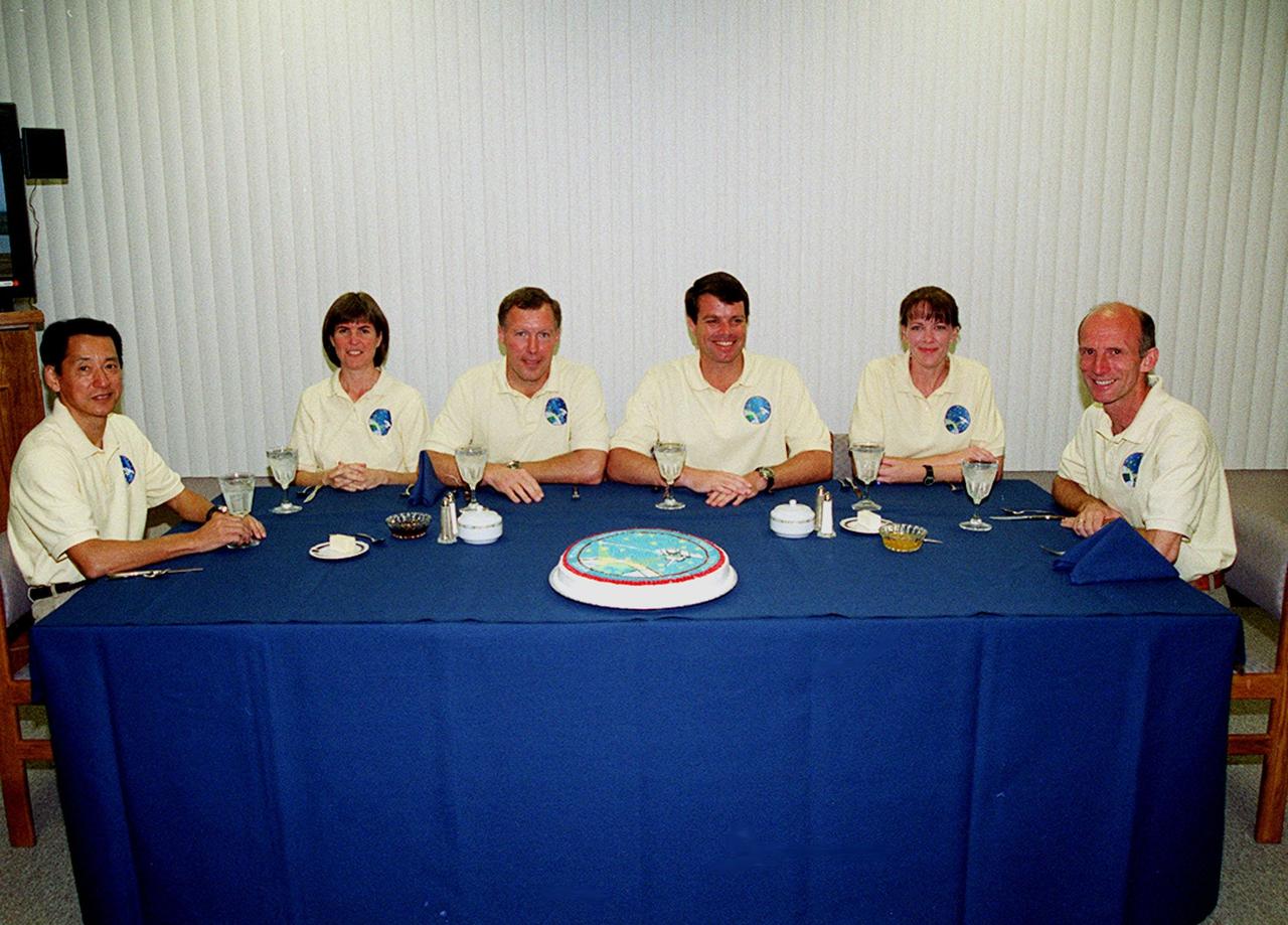 In the Operations and Checkout Building, the STS-99 crew gathers for breakfast before suiting up for launch. From left are Mission Specialists Mamoru Mohri (Ph.D.) and Janice Voss (Ph.D.); Pilot Dominic Gorie; Commander Kevin Kregel; and Mission Specialists Janet Lynn Kavandi (Ph.D.) and Gerhard Thiele. Mohri is with the National Space Development Agency (NASDA) of Japan, and Thiele is with the European Space Agency. Known as the Shuttle Radar Topography Mission, liftoff is scheduled for 12:47 p.m. EST from Launch Pad 39A. The SRTM will chart a new course to produce unrivaled 3-D images of the Earth's surface, using two antennae and a 200-foot-long section of space station-derived mast protruding from the payload bay. The result of the Shuttle Radar Topography Mission could be close to 1 trillion measurements of the Earth's topography. Besides contributing to the production of better maps, these measurements could lead to improved water drainage modeling, more realistic flight simulators, better locations for cell phone towers, and enhanced navigation safety. The mission is expected to last about 11days, with Endeavour landing at KSC Friday, Feb. 11, at 4:55 p.m. EST
