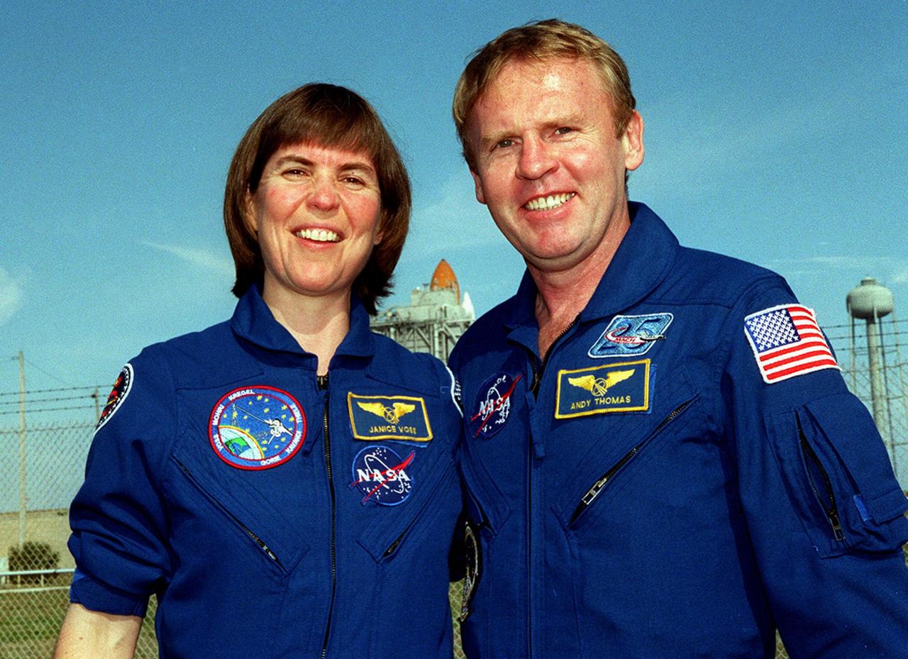 KENNEDY SPACE CENTER, Fla. -- Near Launch Pad 39A, STS-99 Mission Specialist Janice Voss enjoys a reunion with friend and fellow astronaut Andrew Thomas the day before the expected launch of her mission. STS-99, known as the Shuttle Radar Topography Mission (SRTM), is scheduled to lift off 12:47 p.m. EST from Launch Pad 39A. The SRTM will chart a new course to produce unrivaled 3-D images of the Earth's surface, using two antennae and a 200-foot-long section of space station-derived mast protruding from the payload bay. The result of the Shuttle Radar Topography Mission could be close to 1 trillion measurements of the Earth's topography. Besides contributing to the production of better maps, these measurements could lead to improved water drainage modeling, more realistic flight simulators, better locations for cell phone towers, and enhanced navigation safety. The mission is expected to last about 11days, with Endeavour landing at KSC Friday, Feb. 11, at 4:55 p.m