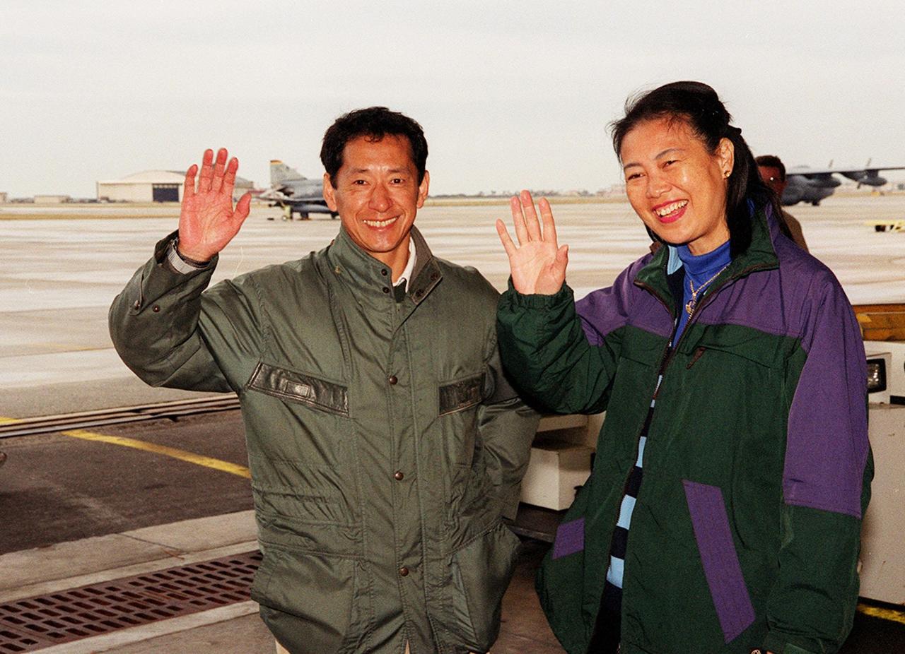 STS-99 Mission Specialist Mamoru Mohri of Japan and his wife, Akiko, wave before their departure from Patrick Air Force Base and return to Houston. With the postponement of the launch of STS-99 on Jan. 31, the crew have an opportunity for more training and time with their families. During the launch countdown, Endeavour's enhanced master events controller (E-MEC) No. 2 failed a standard preflight test. Launch was postponed and Shuttle managers decided to replace the E-MEC located in the orbiter's aft compartment. Launch controllers will be in a position to begin the STS-99 countdown the morning of Feb. 6 and ready to support a launch midto late next week pending availability of the Eastern Range. Known as the Shuttle Radar Topography Mission, it will chart a new course to produce unrivaled 3-D images of the Earth's surface, using two antennae and a 200-foot-long section of space station-derived mast protruding from the payload bay. The result could be close to 1 trillion measurements of the Earth's topography. Besides contributing to the production of better maps, these measurements could lead to improved water drainage modeling, more realistic flight simulators, better locations for cell phone towers, and enhanced navigation safety