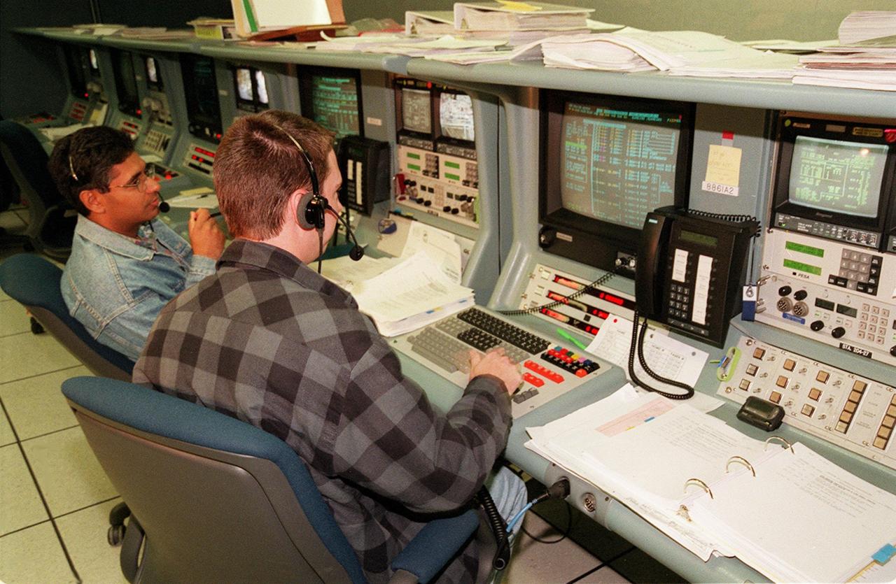 Workers in the Space Station Processing Facility control room monitor computers during a Multi-Equipment Interface Test (MEIT) in the U.S. Lab Destiny. Members of the STS-98 crew are taking part in the MEIT checking out some of the equipment in the Lab. During the STS-98 mission, the crew will install the Lab on the station during a series of three space walks. The crew comprises five members: Commander Kenneth D. Cockrell, Pilot Mark L. Polansky, and Mission Specialists Robert L. Curbeam Jr., Thomas D. Jones (Ph.D.) and Marsha S. Ivins. The mission will provide the station with science research facilities and expand its power, life support and control capabilities. The U.S. Laboratory Module continues a long tradition of microgravity materials research, first conducted by Skylab and later Shuttle and Spacelab missions. Destiny is expected to be a major feature in future research, providing facilities for biotechnology, fluid physics, combustion, and life sciences research. The Lab is planned for launch aboard Space Shuttle Atlantis on the sixth ISS flight, currently targeted no earlier than Aug. 19, 2000