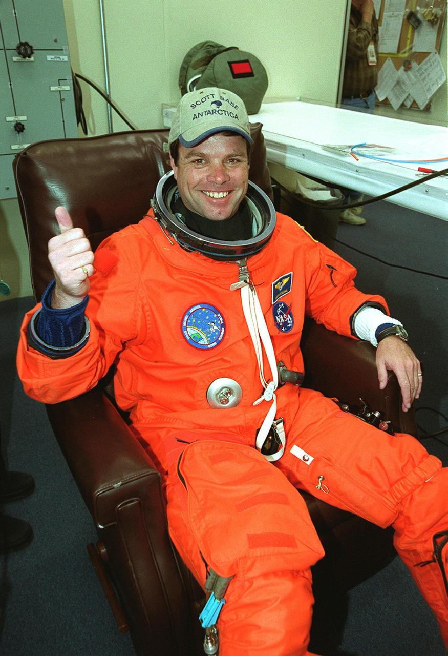 In the Operations and Checkout Building, a smiling STS-99 Commander Kevin Kregel gives a thumbs up for launch as he dons his launch and entry suit during final launch preparations. Known as the Shuttle Radar Topography Mission (SRTM), STS-99 is scheduled for liftoff at 12:30 p.m. EST from Launch Pad 39A. The SRTM will chart a new course to produce unrivaled 3-D images of the Earth's surface. The result of the Shuttle Radar Topography Mission could be close to 1 trillion measurements of the Earth's topography. The mission is expected to last 11days, with Endeavour landing at KSC Tuesday, Feb. 22, at 4:36 p.m. EST. This is the 97th Shuttle flight and 14th for Shuttle Endeavour