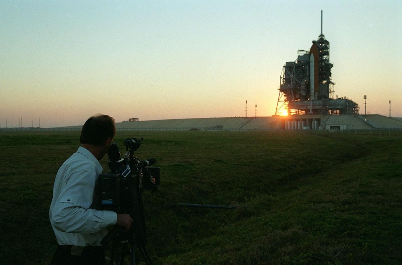 KENNEDY SPACE CENTER, Fla.  -- The day before launch, KSC videographer Glen Benson captures the setting sun behind Space Shuttle Endeavour on Launch Pad 39A. This is a popular view of the Shuttle. Endeavour waits for mission STS-99, known as the Shuttle Radar Topography Mission (SRTM), which will chart a new course to produce unrivaled 3-D images of the Earth's surface. The result of the SRTM could be close to 1 trillion measurements of the Earth's topography. The mission is expected to last 11days, with Endeavour landing at KSC Tuesday, Feb. 22, at 4:36 p.m. EST. This is the 97th Shuttle flight and 14th for Shuttle Endeavour